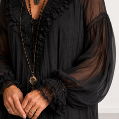 Evelyn Melbourne black ruffled mini dress - neckline and sleeve close-up