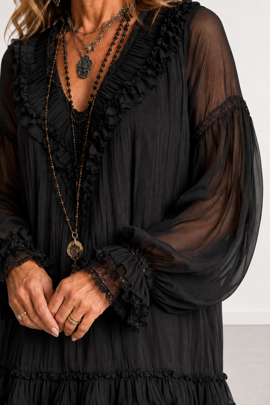 Evelyn Melbourne black ruffled mini dress - neckline and sleeve close-up